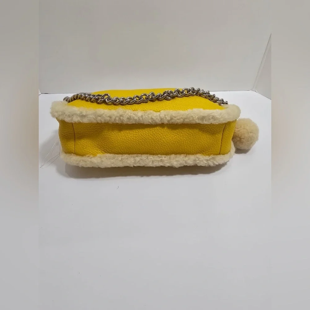NWT Coach Yellow Pebbled Leather Mini Wristlet with Shearling Accents